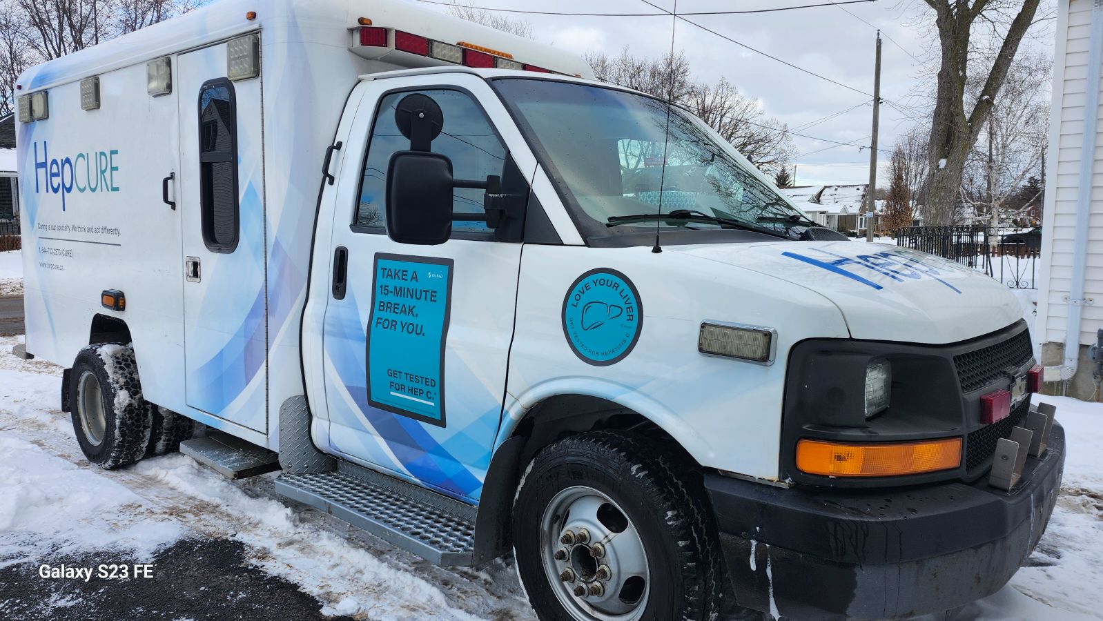 The HepCURE mobile unit out in the community during winter